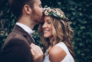 Bride with a loose, textured hairstyle with her husband