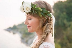 Bride with a braided side ponytail hairstyle