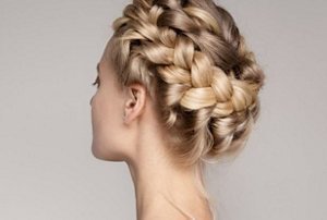Blonde bride with a braided bridal crown hairstyle