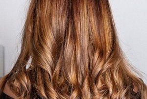 Woman with long brown coppery hair