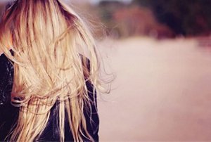 Woman with long, flowing dirty blonde hair