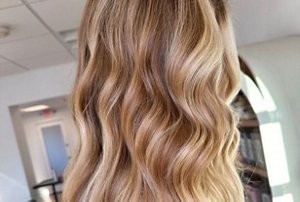 Woman with dirty blonde balayaged hair