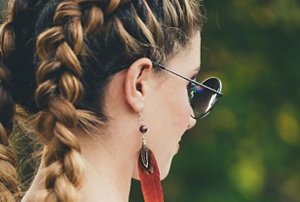Woman at a festival with a braided hairstyle