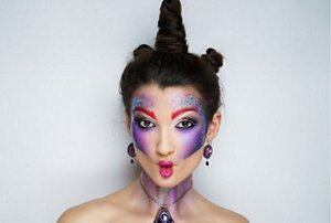 Woman with a unicorn horn-style hairdo