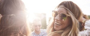 Smiling woman having fun at a music festival