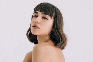 Woman with a classic blunt cut French bob