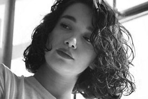 Black and white picture of a woman with a French bob hairstyle