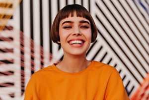 Woman with a French bob with a micro fringe