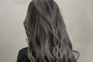 Woman with dark greige hair