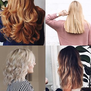 Woman with grey hair smiling into the camera