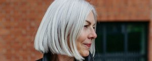 Attractive woman with natural grey hair with a smart, mid-length bob