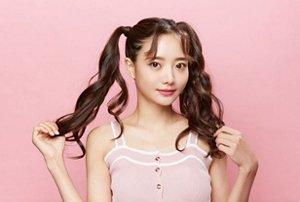 Young woman with her brunette hair in bunches