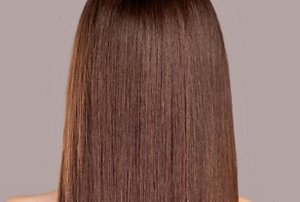 Brunette woman with straight, shiny hair