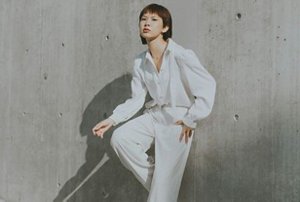 Young, attractive non-binary person with a hime cut