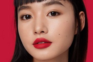 Close-up of a young woman with a hime cut fringe