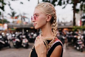 Woman with braided hairstyle at a festival