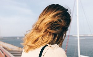 Woman with mid-length golden brown brunette hair