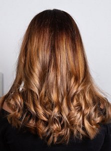 Close up of copper brunette hair with subtle lowlights