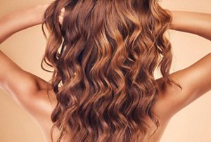 Woman with long mermaid-style wavy hair