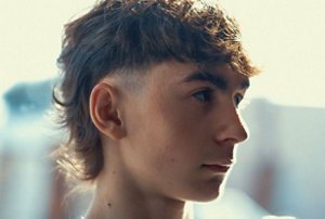 Man with a long styled mullet