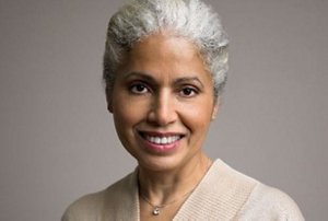 Beautiful mature woman with her grey hair styled in a pompadour