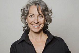 Middle-aged woman with a Jane Fonda-inspired cut