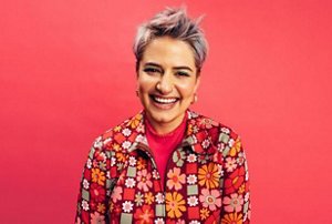 Woman with a textured, dyed pixie cut