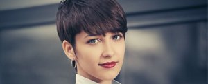 Young woman with a chic, neatly-styled pixie cut