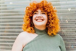 Woman with bright orange hair