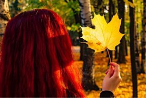 Woman with cherry red hair