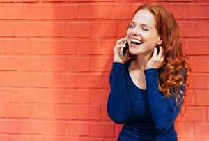 Woman with brick red hair