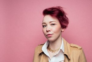 Woman with tinted red and purple hair