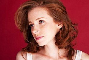 Woman with dark burgundy hair