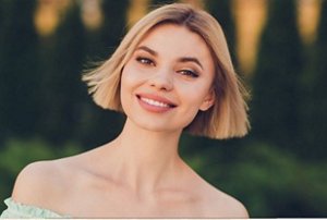 Blonde woman with a blunt-cut classic bob