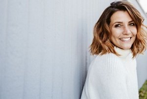 Mature woman with a haircut with textured mid-length layers