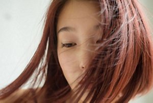 Woman with an angled A-line chin-length bob