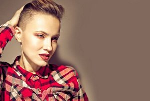 Woman with an undercut with a slicked-back fringe