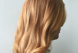Woman with long strawberry blonde hair