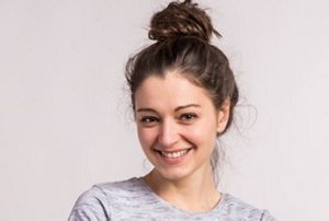 Young woman with a stylish, messy bun hairstyle