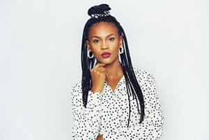 Woman with half-up topknot hairstyle