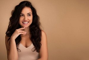 Smiling brunette woman with clean, detangled hair