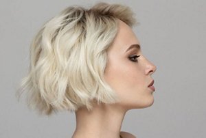 Blonde woman with a tousled, stacked bob