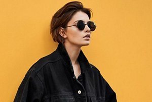 Fashionable young woman with a bixie haircut