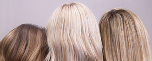 Set of three women with different shades of toned blonde hair