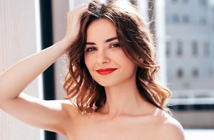 Young woman with warm brown hair