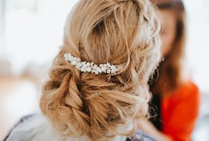 Wedding guest with a low chignon hairstyle