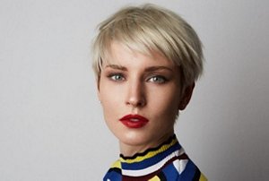 Woman with a choppy tousled pixie cut