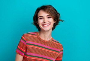 Brunette woman with side-swept fringe