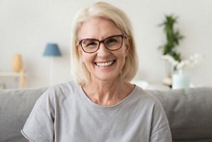 Smiling older woman with a sleek lob haircut