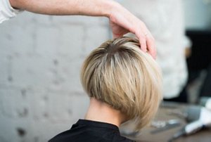 Blonde woman with a layered bob